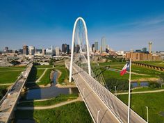 an aerial view of a bridge in the city