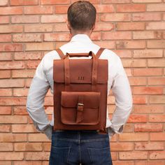 Elevate his everyday style with this premium mens backpack, designed for the modern man on the go. Crafted from high-quality leather, this casual backpack combines sleek aesthetics with practical functionality, making it the perfect accessory for both work and leisure. Whether used as a leather rucksack for business or a leather backpack for men who love to travel, it offers ample space and durability. It's the best leather gift for men, a thoughtful gift for husband, boyfriend, colleague, frien Leather Backpack For Travel, Leather Backed Backpack For Everyday Use, Modern Leather Backpack For Everyday Carry, Slim Backpack, Laptop Backpack Women, Leather Backpack For Men, Custom Backpack, Satchel Backpack, Leather Laptop Backpack