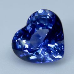 Please visit www.sapphirepal.com to browse our entire gemstones collection  This natural blue sapphire offers a perfect heart cut with the dimensions of 7.50x6.80 mm and a total weight of 1.67 carats. Combining great value and quality, this stone is ideal for jewellery making, in particular for creating beautiful engagement or blue sapphire rings. Add elegance and sophistication to any look with this stunning gem. Natural Blue Sapphire Origin: Ceylon Weight: 1.67 Carats Dimensions  Length      : Blue Sapphire Rings Engagement, Sapphire Rings Engagement, Stone Jewellery Designs, Perfect Heart, Blue Green Sapphires, Sapphire Rings, Natural Gemstone Ring, Sapphire Engagement Ring Blue, Rings Engagement