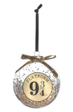 a glass ball ornament with the number nine on it's front and side