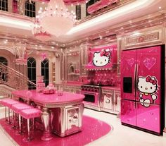 a hello kitty themed kitchen with pink furniture and chandelier hanging from the ceiling