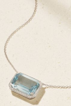 The 'Portrait' pendant on SHAY's necklace references the brand's affinity for art, particularly from the Victorian and Art Deco eras. Cast from 18-karat white gold, it suspends an untreated, light-blue crystal, framed by glinting diamonds that highlight its natural radiance. Fine Jewelry Large Pendant In White Gold, Fine Jewelry White Gold Large Pendant, White Gold Large Pendant Fine Jewelry, Fine Jewelry With Rectangular Pendant For Formal Occasions, White Gold Necklace With Large Pendant For Anniversary, Elegant Hallmarked Rectangular Pendant Jewelry, Fine Jewelry Diamond Large Pendant, Exquisite Platinum Pendant Jewelry, Platinum Gemstone Necklace In Fine Jewelry Style