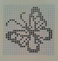 a cross - stitch pattern with squares in the shape of a flower on a white background