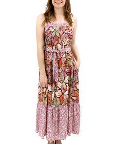 Floral Summer Maxi Dress in Floral Print | Pink Floral Dress The summer dress you’ve been dreaming of! The Floral Summer Maxi Dress has everything you need to keep you comfy while elevating your look for any summer occasion. Smocking at the center back and wide, adjustable straps make for a versatile fit while the detachable waist tie creates a custom, flattering silhouette; all in a head-turning, custom-designed floral print. Why you’ll love it: Pink floral maxi dress with flattering modest squ Pink Tiered Sundress For Beach, Pink Flowy Tiered Beach Dress, Daytime Multicolor Cotton Dresses, Flowy Pink Tiered Dress For Beach, Multicolor Cotton Dresses For Daytime, Summer Vacation Tiered Maxi Dress, Multicolor Cotton Sundress For Vacation, Tiered Cotton Maxi Dress For Garden Party, Pink Tiered Summer Dress For Vacation