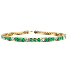 This classic gemstone bracelet features shimmering white diamonds in J-K color, I1-I2 clarity and emerald gemstones. The 6 inch bracelet contains 58 gemstones and diamonds at 3.92 carats. The 6.5 inch bracelet contains 60 gemstones and diamonds at 4.05 carats. The 7 inch bracelet contains 65 gemstones and diamonds at 4.39 carats. The 7.5 inch bracelet contains 70 gemstones and diamonds at 4.73 carats. The 8 inch bracelet contains 74 gemstones and diamonds at 5 carats. The 8.5 inch bracelet conta Luxury Emerald Tennis Bracelet With 17 Jewels, Luxury Emerald Tennis Bracelet For Anniversary, Luxury Emerald Tennis Bracelet For Wedding, Luxury Green Diamond Bracelet For Gift, Luxury Hand Set Green Diamond Bracelet, Luxury Green Diamond Wedding Bracelet, Luxury Green Diamond Bracelet, Luxury Emerald Tennis Bracelet, Luxury Emerald Diamond Bracelet Gift