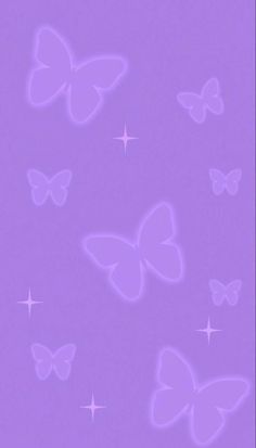 a purple background with many butterflies flying in the air