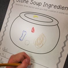 a hand is holding a pencil and drawing a fish in a bowl with the words stone soup ingredient