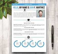 a blue and white resume template on a wooden table