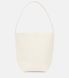 Park North South Medium leather tote bag in white - The Row | Mytheresa Leather Bucket Shoulder Bag, Classic Textured Leather Bucket Bag For Shopping, Everyday Double Handle Bucket Bag With Smooth Grain, Everyday Minimalist Smooth Grain Shoulder Bag, Daily Double Handle Smooth Grain Shoulder Bag, Modern Smooth Grain Bucket Tote Bag, Modern Bucket Bag With Smooth Grain For Daily Use, Smooth Grain Bucket Shoulder Bag For Everyday Use, Classic Smooth Grain Bucket Bag Tote