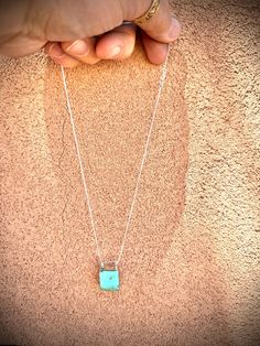 This is a simple but cute little pendant. It is perfect as an everyday accessory. Made of .925 sterling silver with a beautiful turquoise stone and set on an 18" chain. Turquoise Rectangular Pendant Necklace In Sterling Silver, Turquoise Sterling Silver Rectangular Pendant Necklace, Turquoise Sterling Silver Necklace With Rectangular Pendant, Sterling Silver Turquoise Necklaces Stamped 925, Turquoise Sterling Silver Necklaces Stamped 925, Turquoise Sterling Silver Necklace Stamped 925, Sterling Silver Turquoise Necklace With Large Pendant For Gift, Silver Sterling Turquoise Necklace With Rectangular Pendant, Dainty Sterling Silver Turquoise Necklace Gift