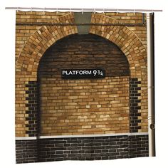 a brick wall with a sign that says platform 94