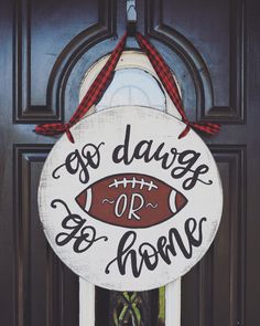 a door hanger that says, eso dawg or be home on it