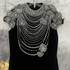 Brand New With Tags, Black With Embellishments. Luxury Embellished Cocktail Dress, Designer Black Embellished Dress, Luxury Black Dress With Rhinestones, Luxury Black Dresses With Rhinestones, Luxury Black Embellished Dress, Designer Sequin Evening Dresses, Black Hand Embellished Evening Dress, Designer Evening Dresses With Sequins, Elegant Black Hand Embellished Dress