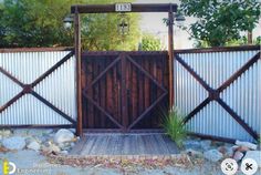 the gate is made of wood and metal