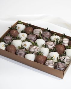 a box filled with chocolate covered strawberries