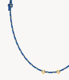 Charms: ResinBeads: 9ct GoldCord: Synthetic PolymerNecklace Length: 24 inches, extendable from 14" Longest Charm Length: 22.5mmFastening: Hand-Knotted Care, alteration and repair information is available here. Blue Beaded Jewelry With Adjustable Cord, Adjustable Yellow Gold Necklace With Cord, Adjustable Yellow Gold Necklace With Adjustable Cord, Adjustable Yellow Gold Necklace With Round Beads, Everyday Diamond Necklace, Charm Bar, Blue Charm, Bubblegum Necklace, Friendship Necklaces