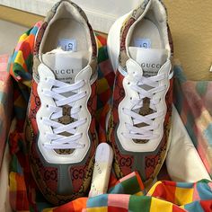 Excellent Brandnew Condition Never Worn Smell New Some From Box. Gucci Rython Multi Color Sneakers Canvas. Size 8 More Likes Woman’s 10-10.5 Comes With Box And Two Dust Cover Gucci Multicolor Sneakers With Rubber Sole, Multicolor Gucci Sneakers With Rubber Sole, Designer Orange Sneakers, Gucci Multicolor Sneakers With Round Toe, Gucci Multicolor Lace-up Sneakers, Multicolor Gucci Leather Sneakers, Luxury Orange Sneakers, Designer Multicolor Sneakers With Rubber Sole, Designer Multicolor Custom Sneakers For Streetwear