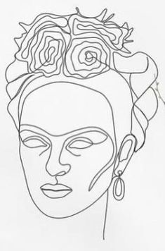 a line drawing of a woman's face with flowers on her head and ear