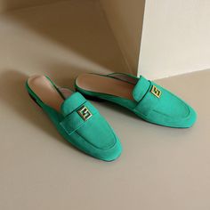 Green mules are totally unique. With suede upper and classic loafer style. these flat mules are stylish and will be amazing if you pair them with white pants. Upper: Suede Lining: Genuine Leather Outsole: Rubber Toe: Round Toe Closure: Slip on Color: Green. Beige is_handmade: Yes Chic Flat Slip-ons For Office, Spring Flat Slip-ons For Office, Spring Season Flat Slip-ons For Office, Spring Office Slip-ons Flat, Spring Office Flat Slip-ons, Summer Workwear Flat Slip-ons, Office Slip-ons With Flat Heel For Spring, Spring Office Slip-on Mules, Trendy Flat Clogs For Spring