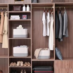 an organized closet with clothes, shoes and other items on it's shelfs