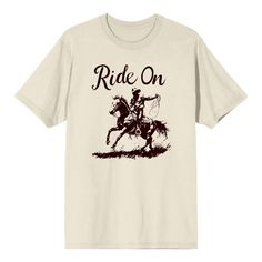 Channel your inner cowboy with this inspirational apparel featuring a big, bold graphic of a cowboy and his horse alongside the good reminder “Ride On”—an eye-catching image that has been professionally printed for long-lasting print quality. Thoughtfully designed for comfort and style, this apparel is made of high-quality materials that make it perfect for all-day, any-day wear. And when it’s time for cleaning, simply machine wash it cold and tumble dry on low for effortless care. Blue Horse, Man Quilt, Cowboy Outfits, Sleeve Packaging, Ride On, Pullover Sweatshirt, Cotton Material, The Good, Short Sleeve Tee