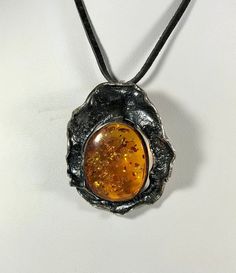 Elevate your jewelry collection with our stunning Genuine Amber Pendant, featuring a spectacular color and weighing 8,3 grams, set in high-quality 925 Sterling Silver. This exquisite pendant is designed especially for women who appreciate unique, handcrafted jewelry that combines elegance with the natural beauty of amber. Key Features: Authentic Baltic Amber: Our pendant showcases genuine Baltic amber, renowned for its stunning and unique color, adding a touch of natural elegance to any outfit. Unique Handcrafted Jewelry, Amber Pendant, Natural Amber, Natural Glow, Baltic Amber, Czech Republic, Pendant Necklaces, Handcrafted Jewelry, Silver Pendant