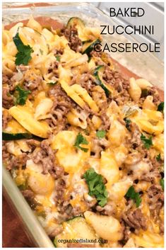 baked zucchini casserole with ground beef and cheese in a glass dish