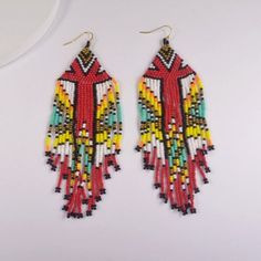 PENDIENTES ANTIGUOS BERBER DEL NORTE DE ÁFRICA : a menudo extrañamos ese par de aretes bereberes con cuentas hechos por nuestra madre o abuela. Los pendientes de cuentas bereberes te transportan a tus tribus originales y despiertan recuerdos de la infancia. Los pendientes de cuentas bereberes te transportan a tus tribus originales y despiertan el recuerdo de la infancia. Pendientes bereberes antiguos nativos puros, diseñados exclusivamente por la diseñadora norteafricana Sliya, siente que tu mam Bohemian Brown Beads For Crafting, Brown Bohemian Beads For Crafting, Bohemian Beaded Earrings With Large Beads, Southwestern Style Large Beads Earrings For Gift, Multicolor Southwestern Style Dangling Beads, Southwestern Multicolor Dangling Beads, Southwestern Style Multicolor Dangling Beads, Southwestern Red Beaded Earrings With Dangling Beads, Southwestern Red Beaded Dangling Earrings