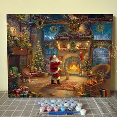 a santa clause standing in front of a christmas fireplace