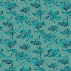 a blue flower pattern on a teal green background with lots of small flowers in the center