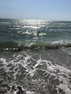 the ocean waves are coming in to shore