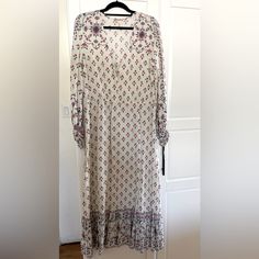 This Is Nwot. I Love This Dress But Sadly Is Too Small For Me. It’s Made Of A Rayon Type Material And Is A Cream Base With Blue And Red Floral Paisley Print. The Sleeves Are Gathered At The Wrist And Have A Tie For Closure. Wear This Is The Spring/Summer With Some Wooden Heeled Clogs For A Boho Vibe! Bohemian Paisley Print Daywear Dresses, White Bohemian Dress With Paisley Print, Flowy Midi-length H&m Dresses, H&m White Maxi Dress For Daywear, H&m Long Sleeve Maxi Dress For Daywear, Fitted Floral Print Maxi Dress By H&m, H&m Bohemian V-neck Dress, Fitted White Maxi Dress By H&m, H&m Flowy Maxi Dress For Daywear