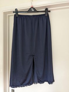 ♥1993 Vintage Navy Blue St Michael Slip Skirt! ♥️Midi length ♥️ Elasticated waistband ♥️UK size 16-18 but will be smaller in modern day sizing ♥️In very good vintage condition, a few small bits of elastic are sticking out of the waistband (as photographed) but it's hardly noticeable and doesn't affect wear at all! Saint Michael, Uk Size 16, Skirt Midi, Slip Skirt, Lace Slip, St Michael, Midi Length, Favorite Outfit, Size 16