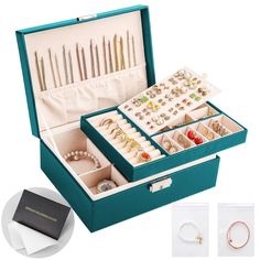 an open jewelry box filled with lots of rings