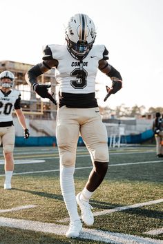 a football player is running on the field