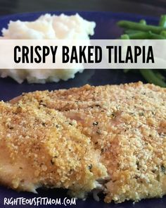 crispy baked tilappa on a blue plate with mashed potatoes and green beans