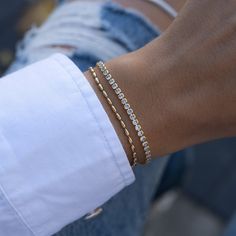 "Super cute beaded bracelet is great for layering or worn on its own! Delicate & chic makes it a great accessory! - - - D E T A I L S - - -  * Made of 925 Sterling Silver * THICK plating of 14k Gold or Rhodium  * Available in 6.25\", 6.75\" or 7\" + .5\" Ext Chain lengths * 2mm Rice Beads * Nickel-free & Hypoallergenic  * Lobster clasp closure with extension chain  Bracelets on Model: TENNIS BRACELET --> https://www.etsy.com/listing/899893520/tennis-bracelet-gold-tennis-bracelet? click_key=7b87b1a3c5a7ba74e2318e00058ba68f4b95e9ad%3A899893520&click_sum=5ad98715&ga_search_query=tennis%2Bbracelet&ref=shop_items_search_3&pro=1&sts=1 Pavé Bar Bracelet --> https://www.etsy.com/listing/1209136756/pave-bar-bracelet-dainty-bracelet-gold?click_key=54e2ad22904bdc08edfe0184adc9945aa6ba31d7%3A120913675 Minimalist Tennis Bracelet With Adjustable Chain For Everyday, Adjustable Diamond Bracelet For Everyday Wear, Dainty Adjustable Chain Bangle Bracelet, Dainty Stackable Tennis Bracelet For Everyday, Dainty Everyday Stackable Tennis Bracelet, Minimalist Tennis Bracelet For Everyday Wear, Minimalist Stackable Adjustable Tennis Bracelet, Minimalist Adjustable Stackable Tennis Bracelet, Minimalist Stackable Tennis Bracelet