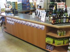 a store counter with beer bottles on it