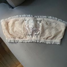 Size M Victoria’s Secret Bandeau- All Lace- Never Worn And Has Its Tag On. Strapless Lace Top With Built-in Bra, Strapless Lace Trim Tube Top, Summer Bandeau Tube Top With Lace Trim, Bandeau Lace Trim Tube Top For Summer, White Lace Sleeveless Tube Top, Stretch Strapless Tops With Lace Trim, Stretch Lace Tube Top With Lace Trim, White Lace Bandeau Tube Top, Fitted White Lace Tube Top