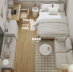 an overhead view of a bedroom with a bed, couch and desk in it's corner