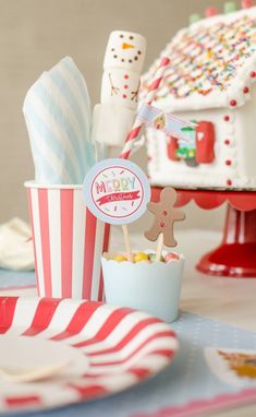 a close up of a table with cupcakes and other items on the table