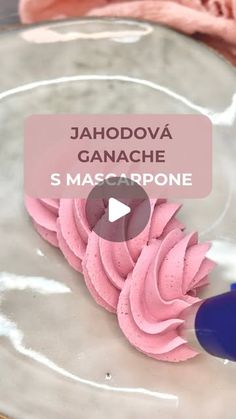 there is a cake with pink frosting on it and the words jahodova ganache s mascarpone