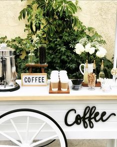 a table with coffee and drinks on it