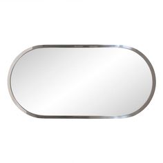 a mirror that is on the wall with a metal frame and an oval shaped edge