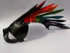 Mask with multicolored or black punk crest. Made of leather. Adjustable. Comfortable and ideal to take to parties and festivals. This mask is to stand out when you wear it, it has strength and a personality of its own. Composed of 9 individually modeled pieces that form a crest which gives the mask a unique movement. I know who you want to be behind masquerade. Black Fantasy Festival Masks, Black Punk Eye Mask, Adjustable Black Masks For Festivals, Black Punk Style Masks For Festivals, Black Punk Style Festival Masks, Punk Style Black Festival Masks, Donnie Darko Mask, Deer Mask, Future Costume