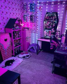 a room filled with lots of purple lights and furniture in front of a wallpapered wall