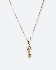 Meet Carolina, your next jewelry obsession. Its vintage key pendant is perfect for layering or wearing it by itself. MATERIALS & SIZE Material: 18k gold filled chain and 18k gold plated pedant Size: 16 in. chain Extender: 2 in. JEWELRY CARE Most of our jewelry is tarnish resistant, hypoallergenic, safe for sensitive skin. Handmade with ♡ in New York. - To maintain the beauty of your jewelry, whether it’s stainless steel, gold plated, or gold-filled, always avoid saltwater, chlorine (swimming poo Vintage Key Necklace, Key Necklace Vintage, Vintage Key, Vintage Keys, Key Necklace, Chain Extenders, Key Pendant, Gold Filled Chain, Jewelry Care