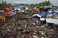 a bunch of houses that are next to each other in the dirt and debris covered ground