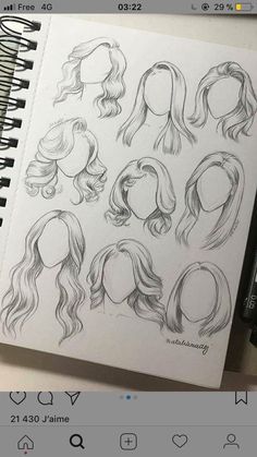 a drawing book with some drawings of different hair styles on the page and an iphone next to it