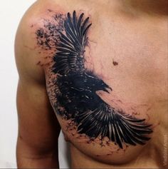 a man with a tattoo on his chest has a black bird painted on it's chest